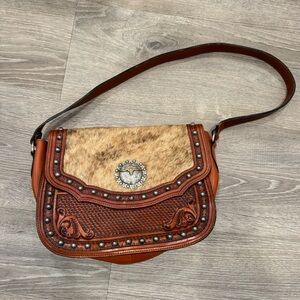 Western Tooled Leather Crossbody Bag w/ Hair-On Hide Flap & Stud Details